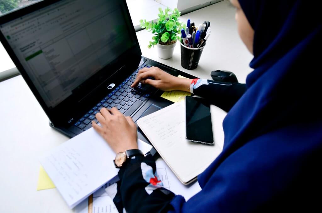 person looking at computer